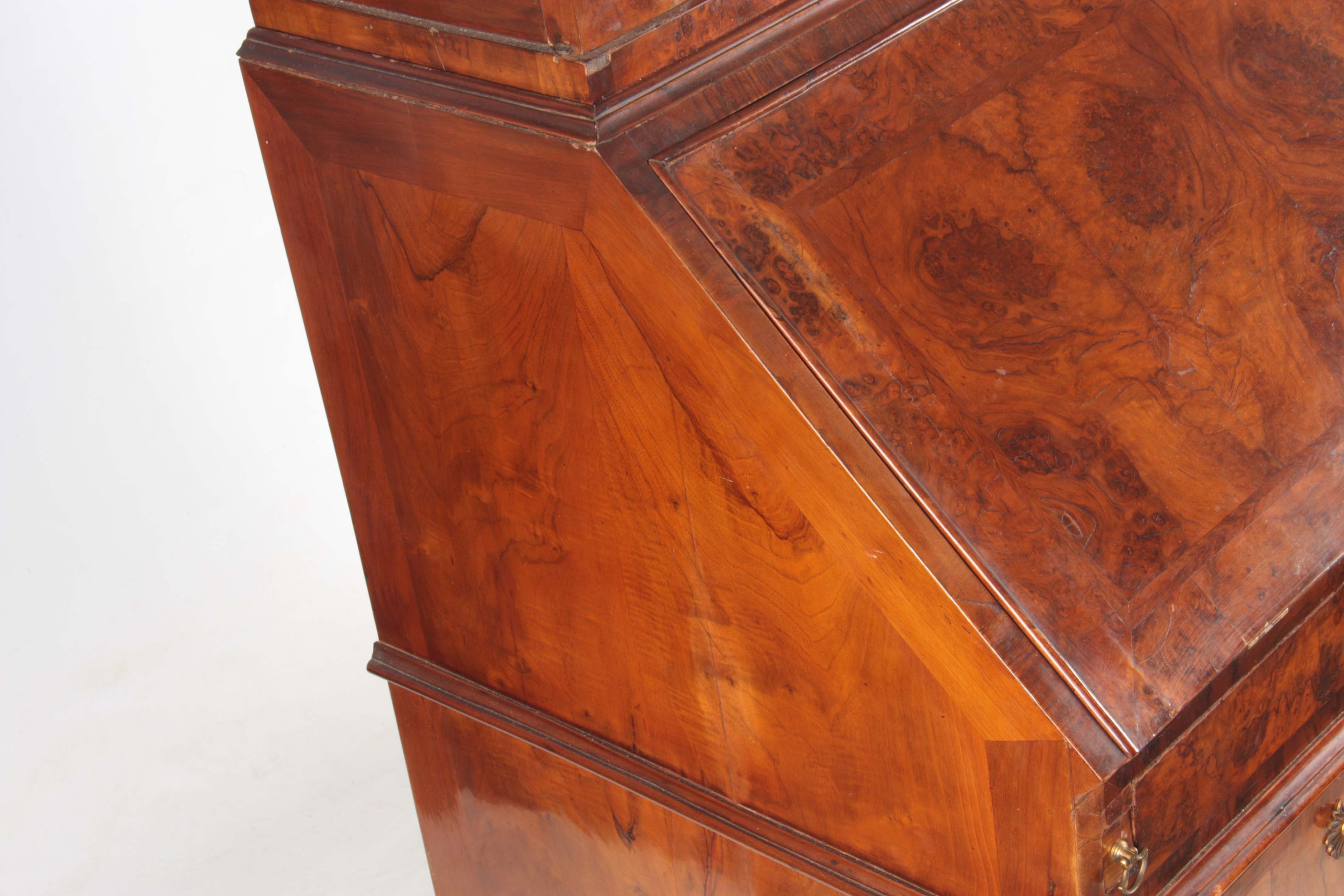 A WILLIAM AND MARY BURR WALNUT BUREAU BOOKCASE with broken arch pediment above shaped mirrored doors - Image 12 of 14