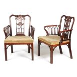 A PAIR OF EARLY 19TH CENTURY CARVED MAHOGANY CHIPPENDALE DESIGN OPEN ARMCHAIRS OF GENEROUS SIZE