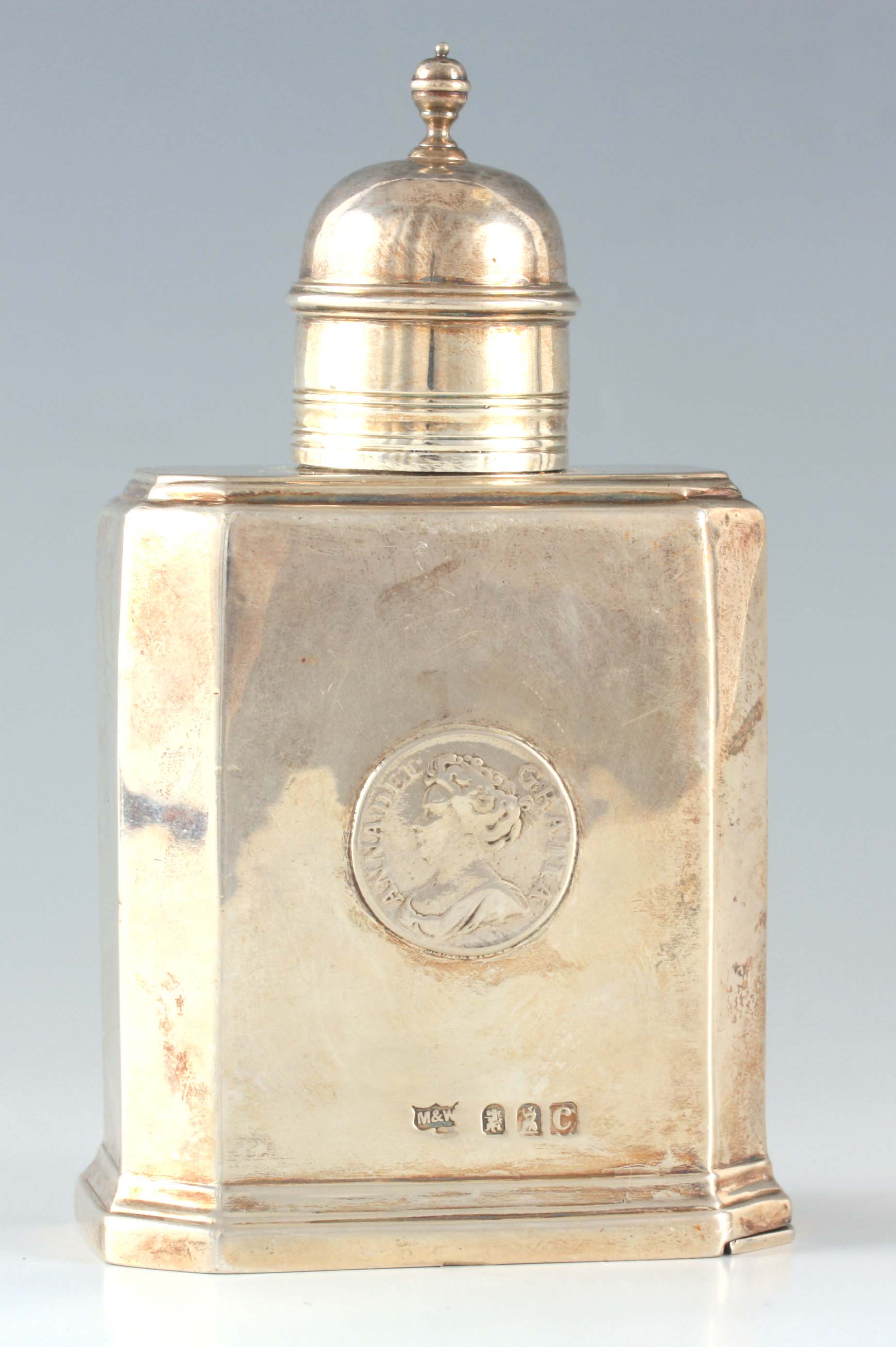 A LATE 19TH CENTURY SILVER TEA CADDY BY MAPPIN AND WEBB with domed finial and clipped corners by