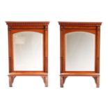 A PAIR OF EDWARDIAN SATINWOOD AND MAHOGANY INLAID HANGING MIRRORS with moulded cornice above