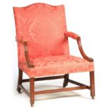 A MID 18TH CENTURY MAHOGANY GAINSBOROUGH CHAIR OF GENEROUS SIZE with shaped upholstered back above