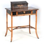 A LATE 19TH CENTURY AESTHETIC PERIOD BAMBOO WRITING TABLE with raised painted back above a leathered