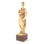 AN 18TH/19TH CENTURY EUROPEAN CARVED IVORY FIGURE OF A CLASSICAL MAIDEN mounted on a mahogany base
