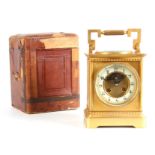 A LARGE FRENCH GILT BRASS CARRIAGE CLOCK WITH COMPASS AND THERMOMETER the moulded case with hinged