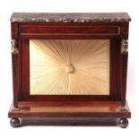 A REGENCY BRASS INLAID MAHOGANY EGYPTIAN STYLE SIDE TABLE with marble top above a frieze drawer