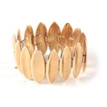 A LADIES 9CT GOLD BRACELET with concave oval links, app. 63.6g