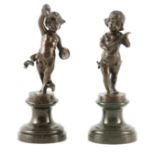 A PAIR OF LATE 19TH CENTURY PATINATED FIGURAL BRONZE SCULPTURES modelled as a young boy and girl