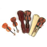 A SELECTION OF FOUR VIOLINS including a French Violin stamped Gavigny, Paris length of back 365mm.