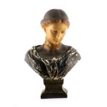A 19TH CENTURY POLYCHROMED WAX BUST OF A YOUNG WOMAN on carved shoulders and wooden base,