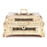 A RARE LATE 18TH CENTURY RUSSIAN ENGRAVED BONE TEA CADDY the locking lid with hinged handle having