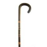 A LATE 19TH CENTURY SEGMENTED HORN AND BONE WALKING STICK possibly Rhino horn 87cm overall
