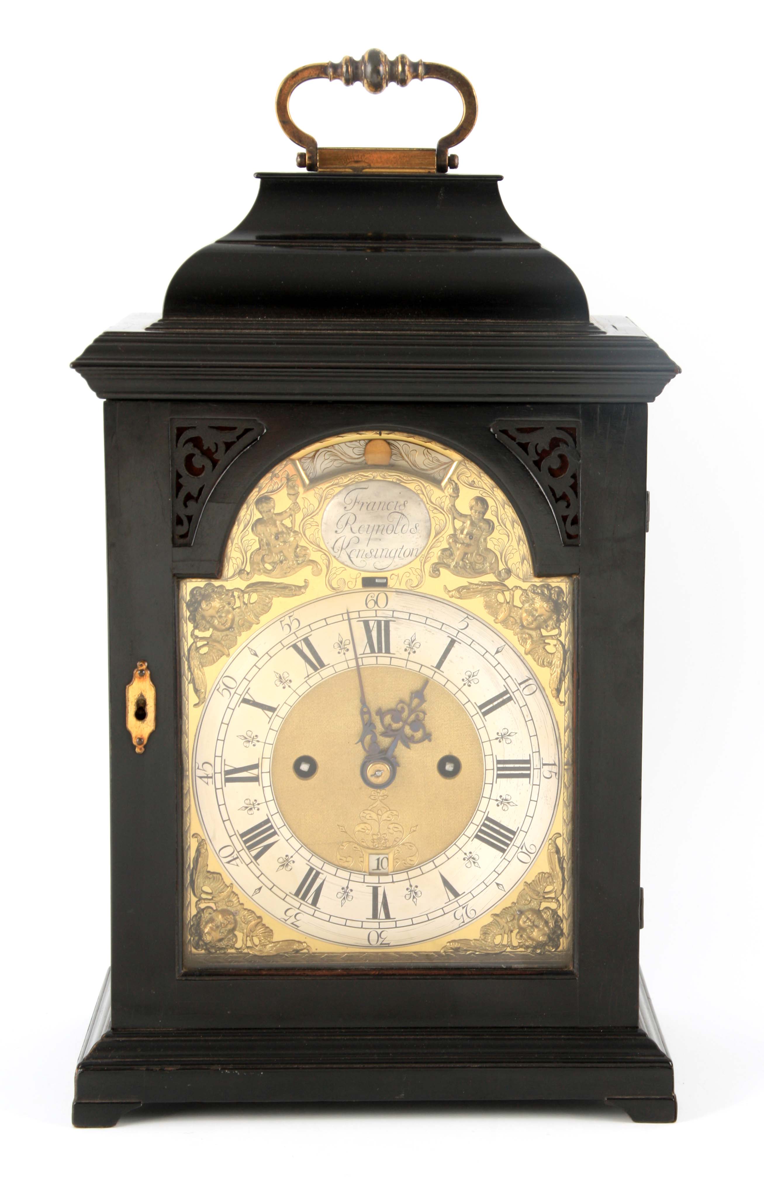 FRANCIS REYNOLDS, KENSINGTON. A GEORGE II EBONISED VERGE BRACKET CLOCK the case with inverted bell