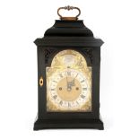 FRANCIS REYNOLDS, KENSINGTON. A GEORGE II EBONISED VERGE BRACKET CLOCK the case with inverted bell