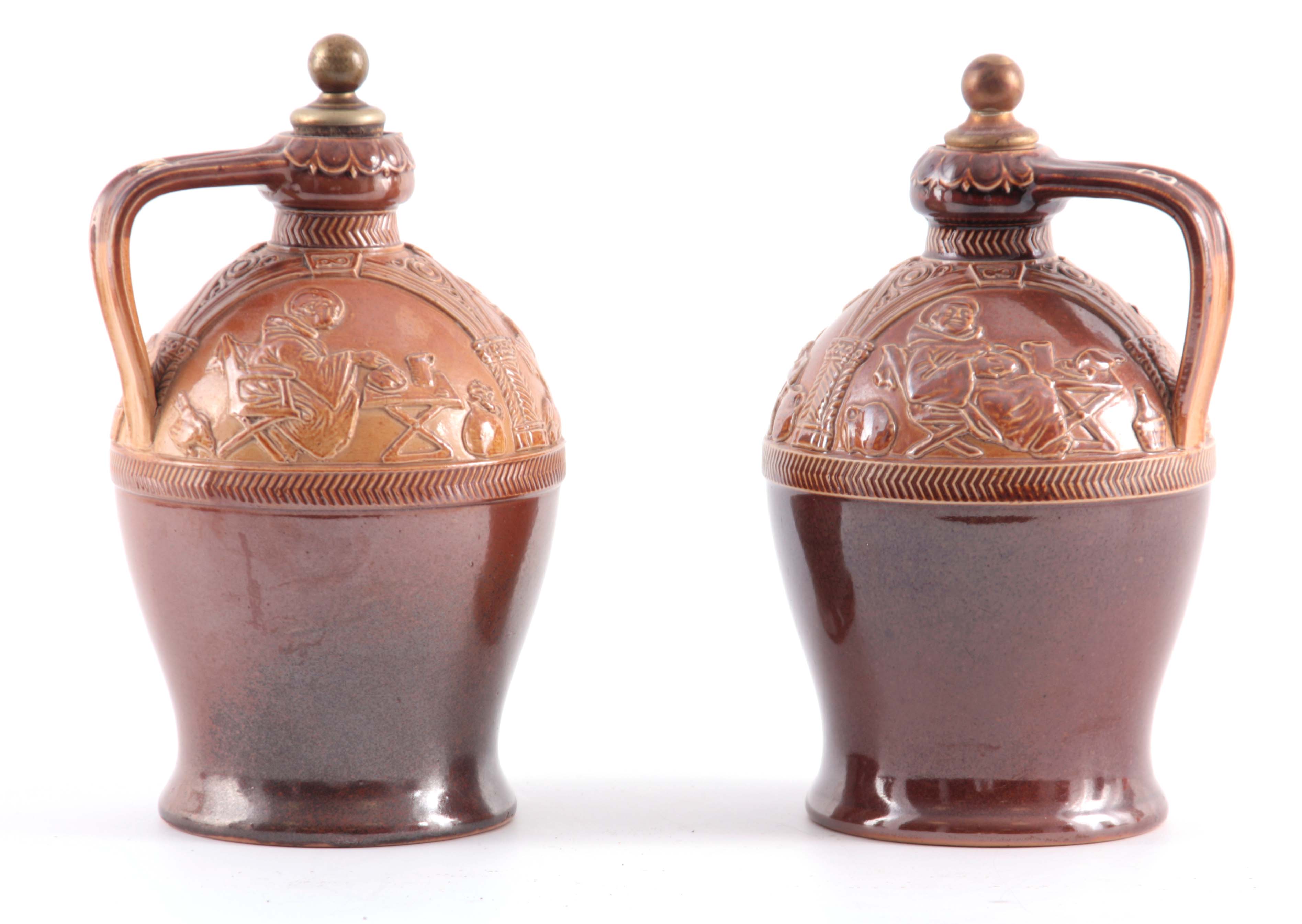 A PAIR OF LATE 19TH CENTURY DOULTON LAMBETH IRISH WHISKEY AND BRANDY DECANTERS with stoppers, having