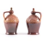 A PAIR OF LATE 19TH CENTURY DOULTON LAMBETH IRISH WHISKEY AND BRANDY DECANTERS with stoppers, having