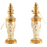A PAIR OF 19TH CENTURY CHINESE EXPORT OMOLU MOUNTED CANTONESE OIL LAMPS converted to electric,