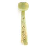 A CHINESE CARVED JADE RUYI SCEPTER carved with fungus head, the shaft of tapering form with