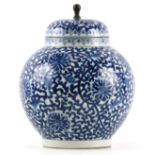 A 19TH CENTURY CHINESE LARGE BLUE AND WHITE BULBOUS GINGER JAR AND COVER with all over chrysanthemum