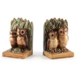 A MATCHED PAIR OF EARLY 20TH CENTURY DOULTON LAMBETH STONEWARE BOOKENDS DESIGNED BY HARRY SIMEON