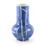 A LARGE JAPANESE PORCELAIN VASE BY MAKAZU KOZAN of baluster form with blue ground and white bamboo