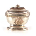 A CONTINENTAL SILVER PLATED OVAL BOWL AND COVER with stepped lid and applied badge to the body,
