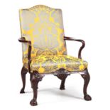 A GOOD GEORGE II WALNUT OPEN ARMCHAIR OF GENEROUS SIZE with upholstered back and seat and shepherd's