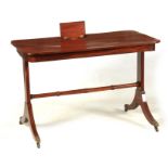 A LATE GEORGE III MAHOGANY WRITING TABLE ATTRIBUTED TO GILLOWS with rounded corners and lift up