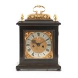 WILLIAM WHITTINGHAM, LONDON. A CHARLES II EBONISED BASKET TOP BRACKET CLOCK the case surmounted by a