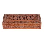 A FINE QUALITY 19TH CENTURY ANGLO-INDIAN CARVED SANDALWOOD LIDDED BOX, the body carved in deep