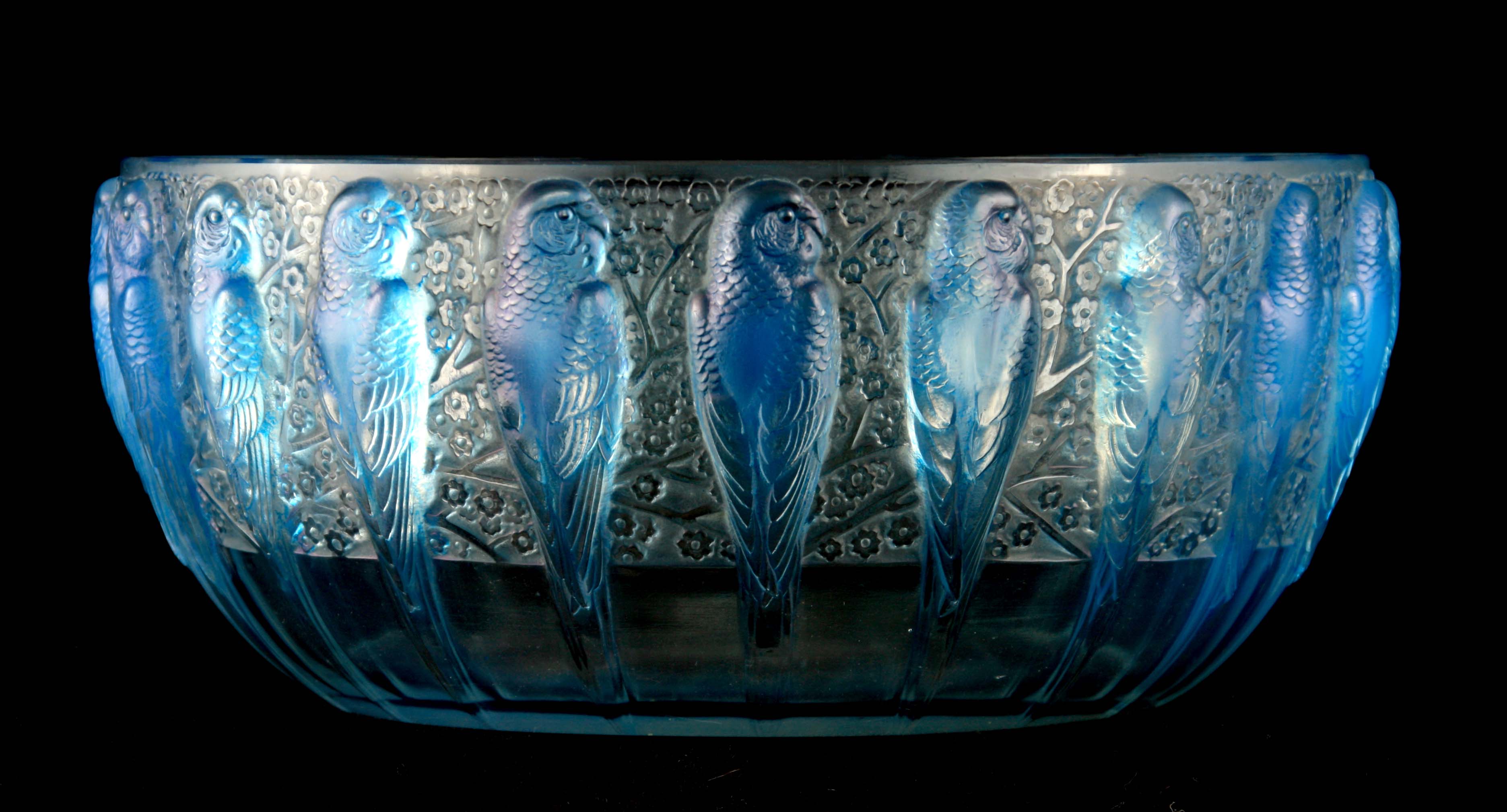 R. LALIQUE, FRANCE A 20TH CENTURY OPALESCENT PERRUCHE BOWL HIGHLIGHTED WITH BLUE STAINING