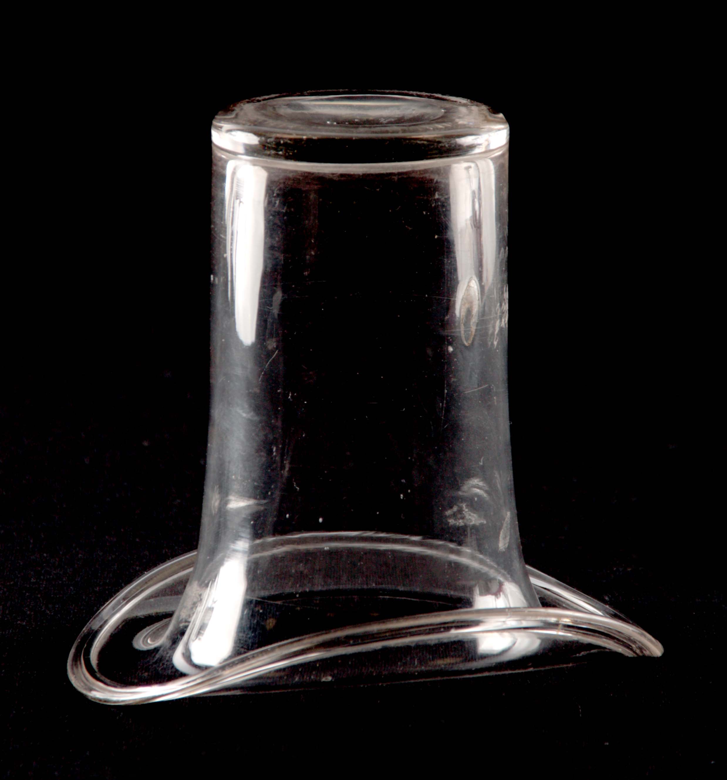 A GEORGIAN NOVELTY CLEAR GLASS MATCHSTICK HOLDER IN THE FORM OF A TOP HAT 11cm high.