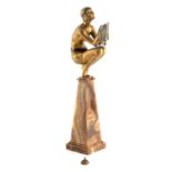 GEORGE DUVERNET. AN ART DECO GILT BRONZE SCULPTURE ‘OBLIVION’ OF A CROUCHING DANCER, mounted on a