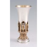 AN ELIZABETH II COMMEMORATIVE SILVER GILT GOBLET formed as Ripon Cathedral having figures in the