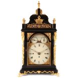 SPENCER & PERKINS, LONDON. A GEORGE III EBONISED AND ORMOLU MOUNTED QUARTER CHIMING BRACKET CLOCK