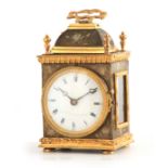 A 19TH CENTURY FRENCH PENDULE D OFFICIER STYLE MANTEL CLOCK having a patinated brass case with