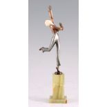 JOSEF LORENZL. AN ART DECO SILVERED BRONZE AND IVORY SCULPTURE modelled as a dancer with copper