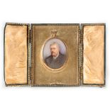 AN EARLY 20TH CENTURY 15CT GOLD FRAMED MINIATURE PORTRAIT ON IVORY of a gentleman, 56mm high not