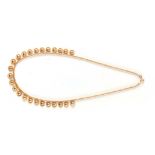 A LADIES 18CT GOLD NECKLACE with ball and hoop links 42cm long, app. 17g