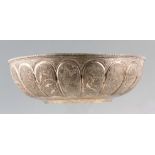 A 19TH CENTURY EASTERN SILVERED BRONZE BOWL finely decorated with panels of woodland animals -