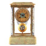 A LATE 19TH CENTURY FRENCH ONYX, BRASS AND CHAMPLEVE ENAMEL MANTEL CLOCK the case with moulded