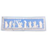 AN 18TH/19TH CENTURY WEDGWOOD JASPERWARE STYLE PLAQUE depicting a classical Greek scene, 46cm wide.