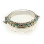 A 19TH/20TH CENTURY SILVER ENAMEL COMPACT possibly Russian, having a domed crystal hinged lid with