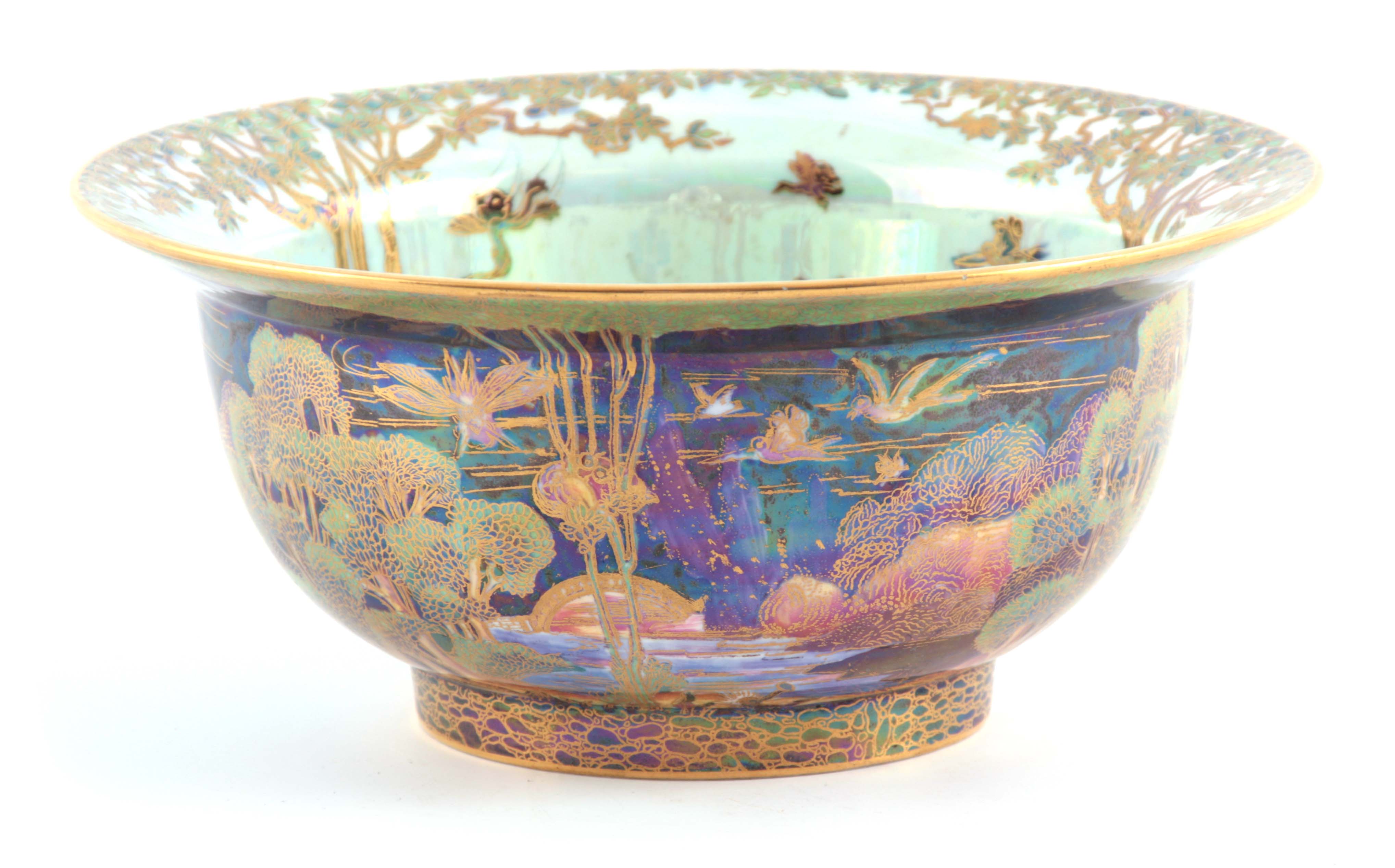 A FINE WEDGWOOD FAIRYLAND LUSTRE FOOTED BOWL WITH EVERTED RIM AFTER DESIGNS BY DAISY MAKEIG JONES