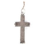 A 17TH CENTURY ENGRAVED RELIQUARY SILVER CROSS engraved with an image of Christ to one side and