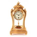 AN EARLY 20TH CENTURY URANIA 400-DAY TORSION CLOCK the ormolu art nouveau case inset with bowed