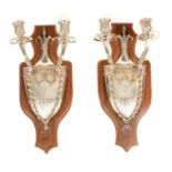 A PAIR OF EARLY 20TH CENTURY SILVERED BRONZE ADAM STYLE HANGING TWO BRANCH CANDELABRA of shield