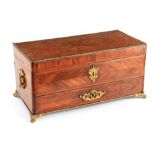 A 19TH CENTURY FRENCH KINGWOOD AND ORMOLU MOUNTED TABLE CASKET with geometric cross-banded and