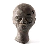 A NIGERIAN BENIN BRONZE BUST OF AN AFRICAN MAN 18.5cm high.