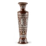 A BRONZE INLAID SILVER KIRO WARE TAPERING VASE depicting Egyptians and hieroglyphics 20cm high.
