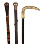 A SELECTION OF TWO MINIATURE WALKING STICKS AND A SECTIONAL HORN STICK two with nickel and white